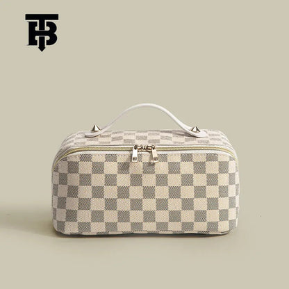 Front view of retro checkered makeup bag showing pattern and handheld strap