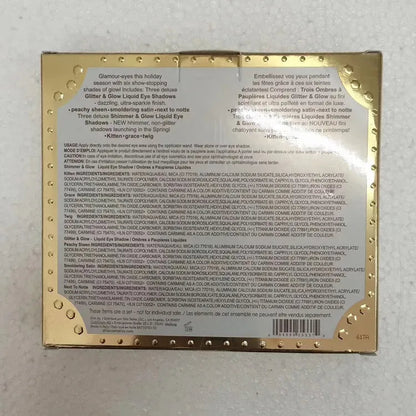 Six liquid eyeshadow shades in earth tones displayed in packaging