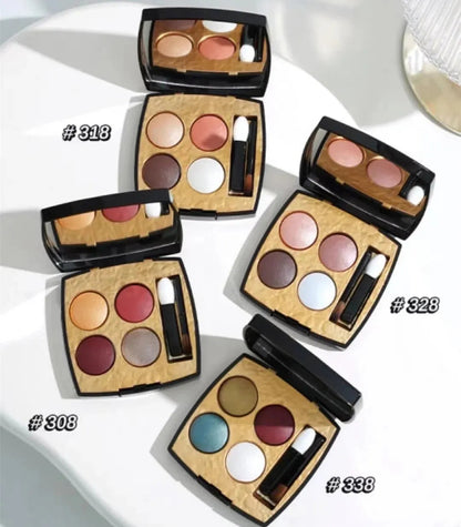 Four-color eyeshadow palette showing matte and shimmer finishes