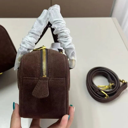 Interior view of the handbag showing spacious compartments for organization
