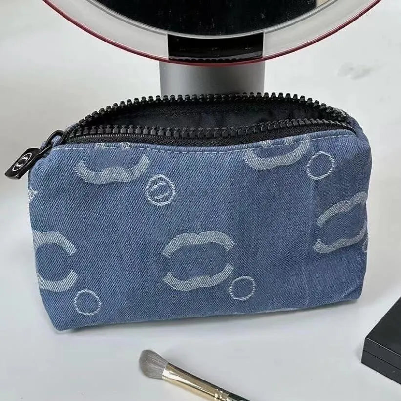 Premium cosmetic pouch set displayed in neutral beige color