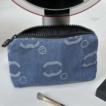 Premium cosmetic pouch set displayed in neutral beige color
