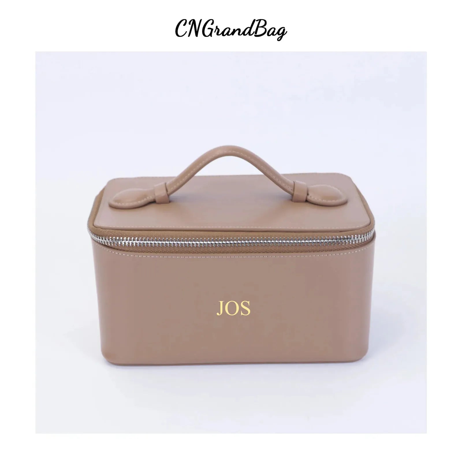 Front view of leather makeup bag showing handheld design and closure