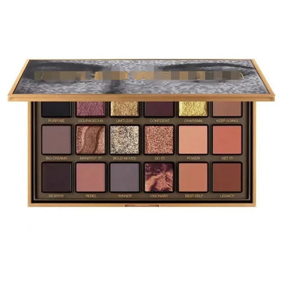 Close-up view of eyeshadow palette with glitter and shimmer textures