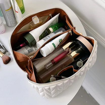 Interior view showing multiple compartments of the cosmetic bag