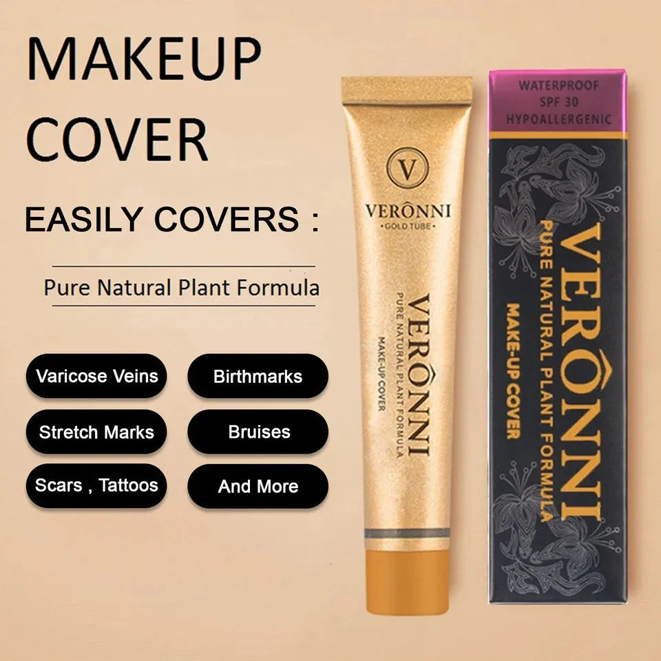 Cream concealer stick in multiple shades arranged on white surface