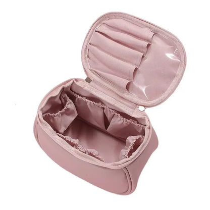 Open interior of the travel cosmetic bag showing organized storage spaces