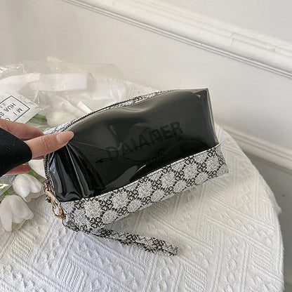 Interior view of toiletry bag showing multiple compartments for organization