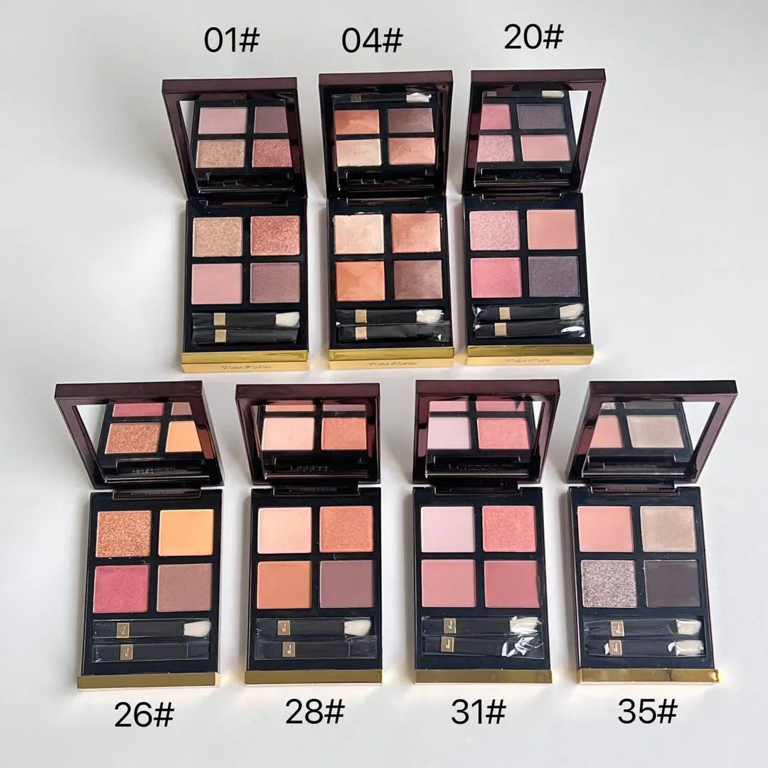 Eyeshadow palette open with dual-ended applicator brush visible