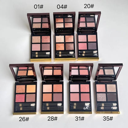 Eyeshadow palette open with dual-ended applicator brush visible