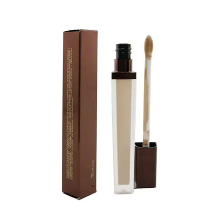Swatch demonstration showing different concealer shades on skin tone