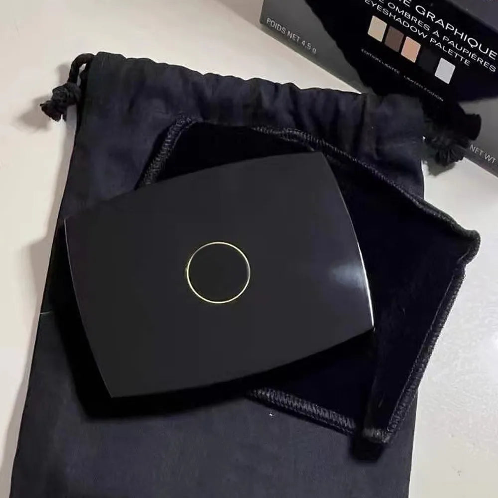 Eyeshadow palette open showing five color options in compact case