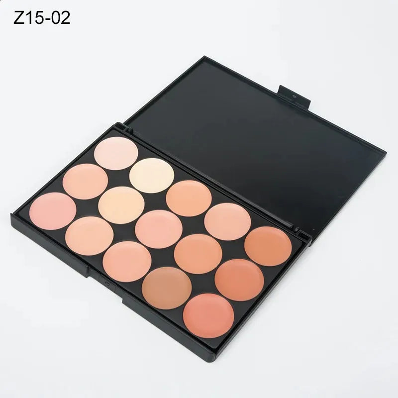 Open makeup palette showing multiple cream concealer shades arranged in rows