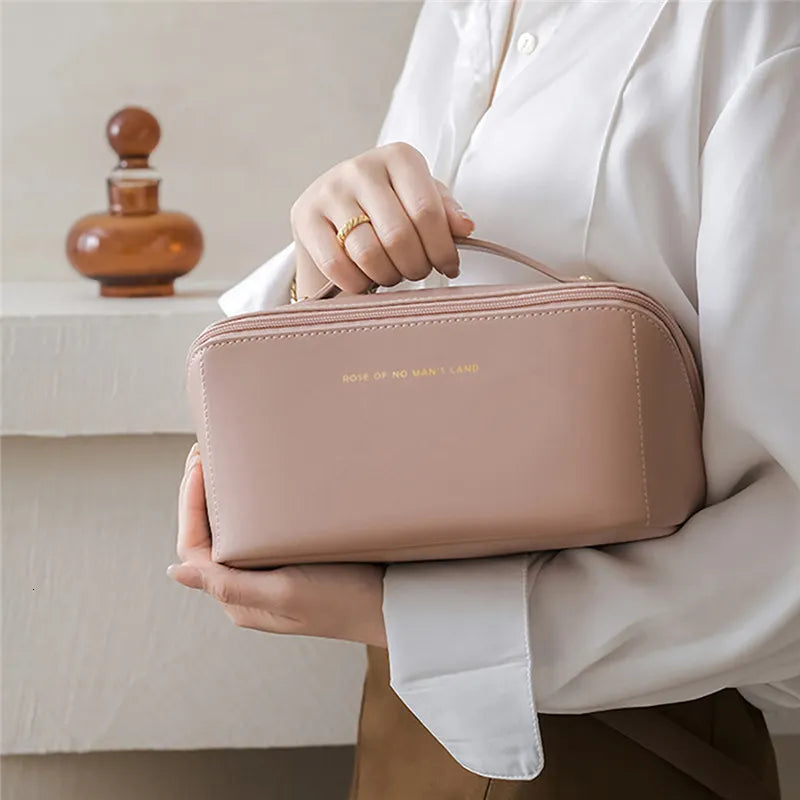 Cosmetic bag displayed alongside makeup items demonstrating storage capacity
