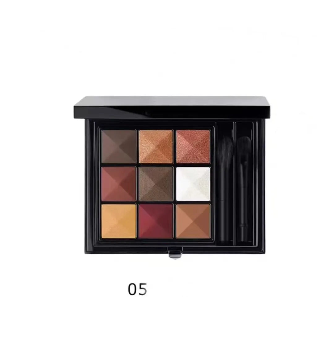 Close-up view of eyeshadow palette with light and shimmer shades