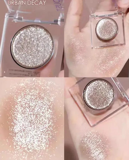 Four monochrome eyeshadow shades in a compact palette with mirror