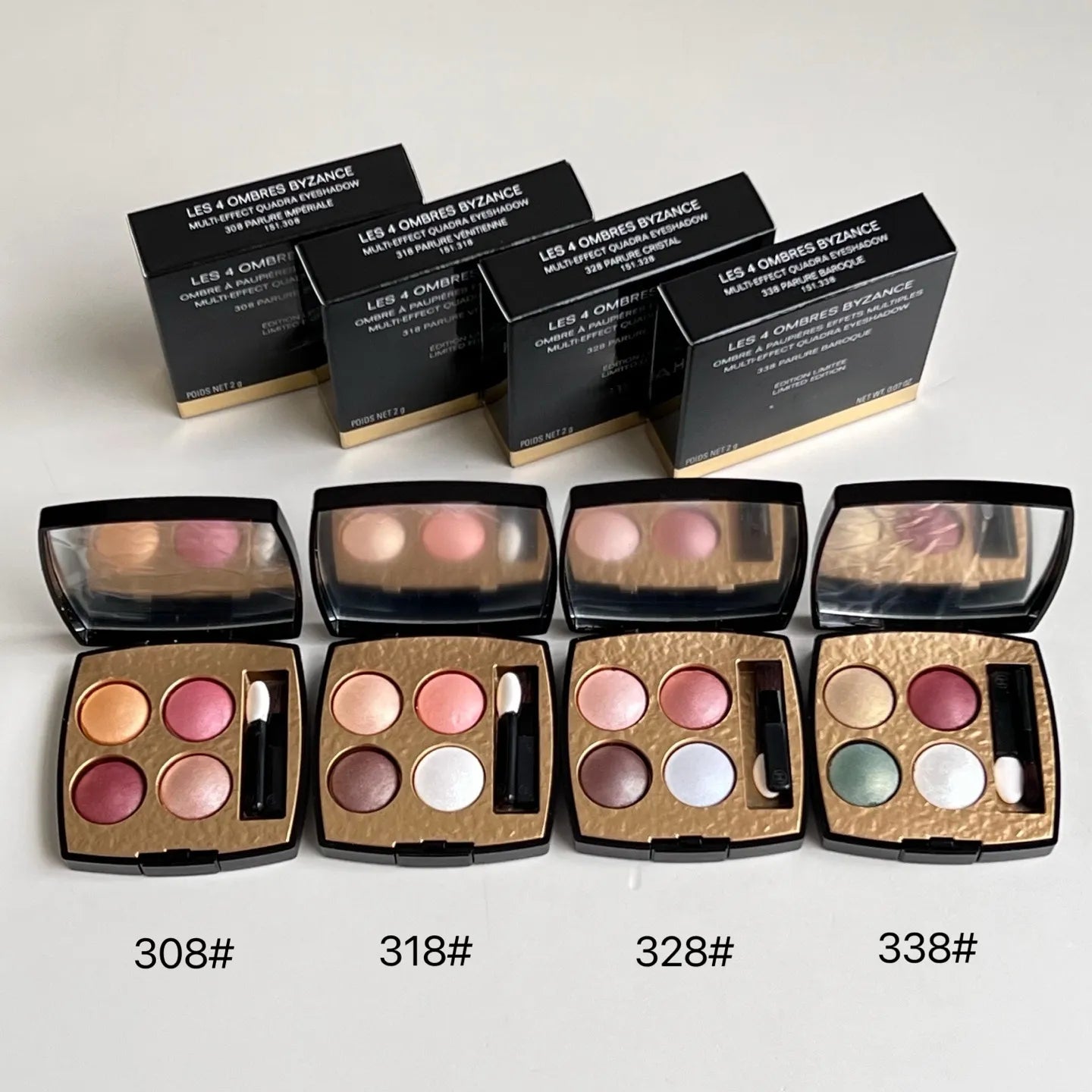 Four-color eyeshadow palette showing matte and shimmer finishes