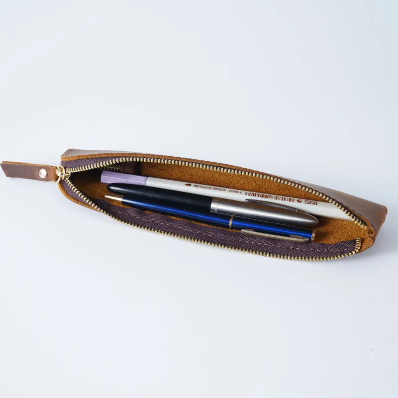 Close-up view of the textured leather material on the pencil case