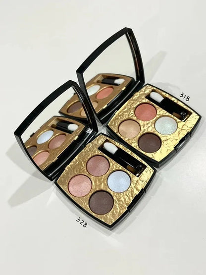 Close-up view of matte and shimmer eyeshadow textures in palette