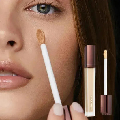Liquid concealer stick in neutral packaging on white background