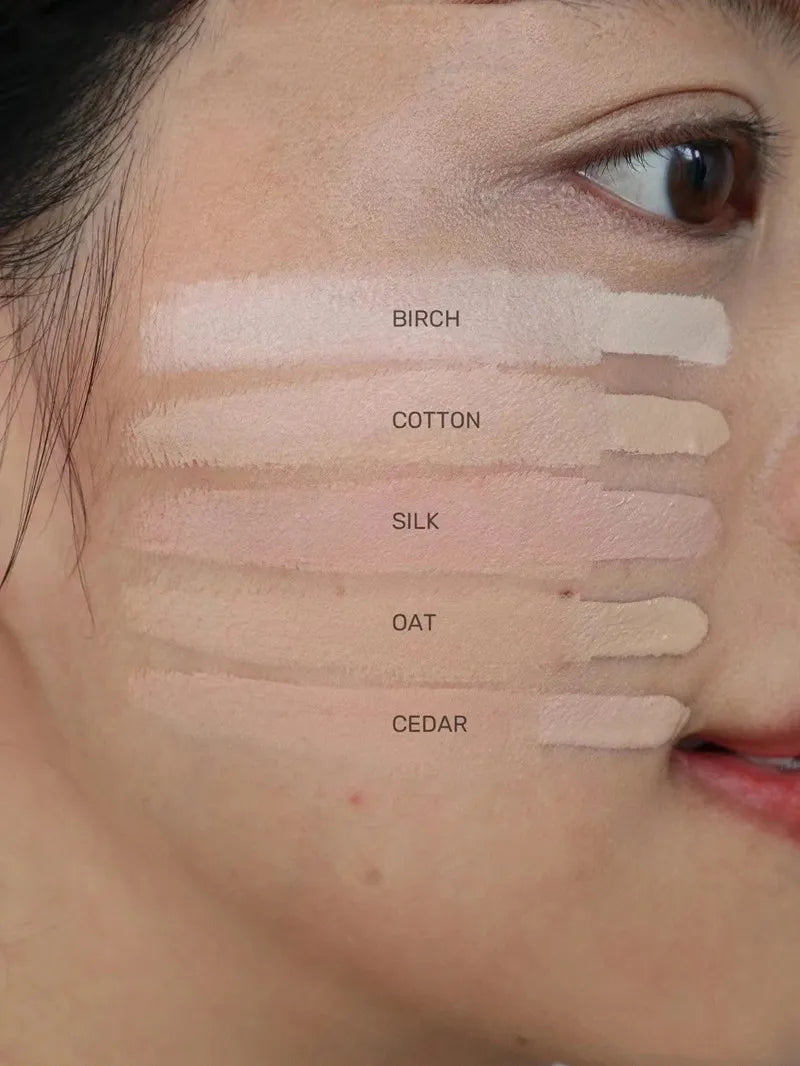 Swatch demonstration showing concealer blended on skin in natural light
