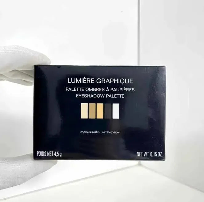 Limited edition eyeshadow palette with five pressed powder shades displayed open