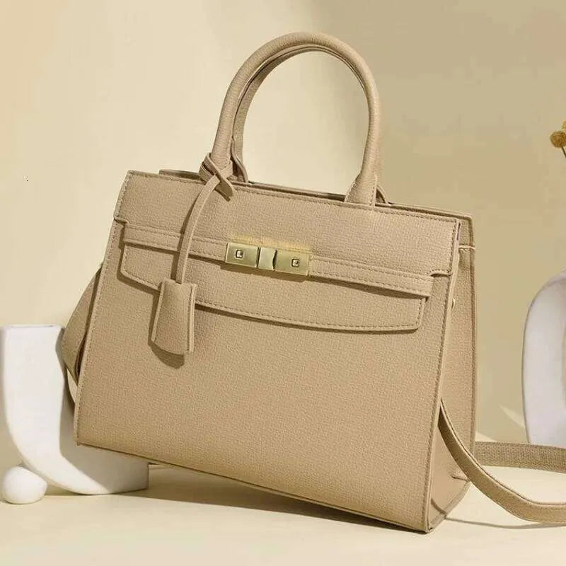 Front view of leather women's shoulder bag showing vintage design