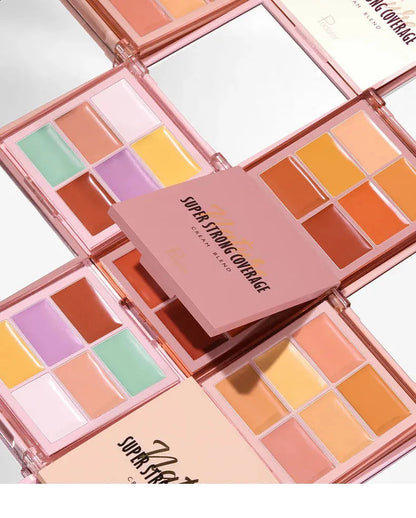 Open concealer palette showing multiple shade options arranged in compact