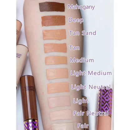 Swatches of concealer shades on skin showing color variations