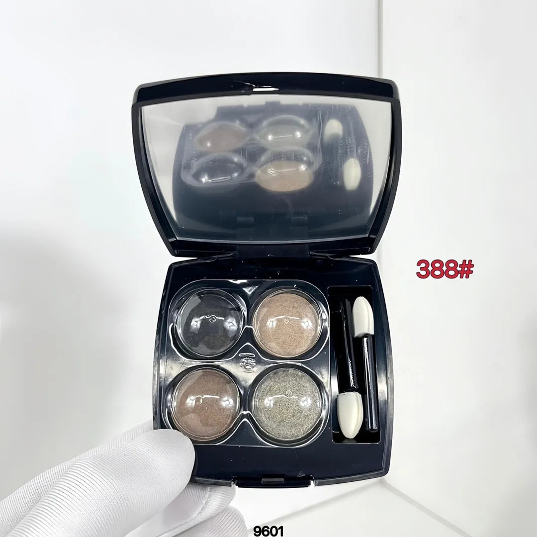 Four-color eyeshadow palette with coordinated shades in a compact case