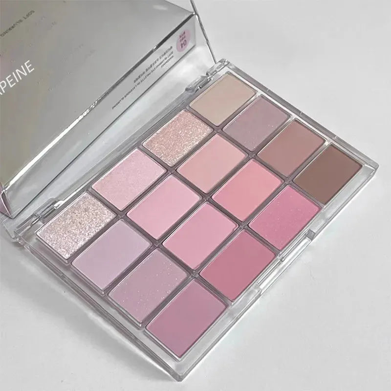 Open eyeshadow palette displaying 20 low saturation matte shades