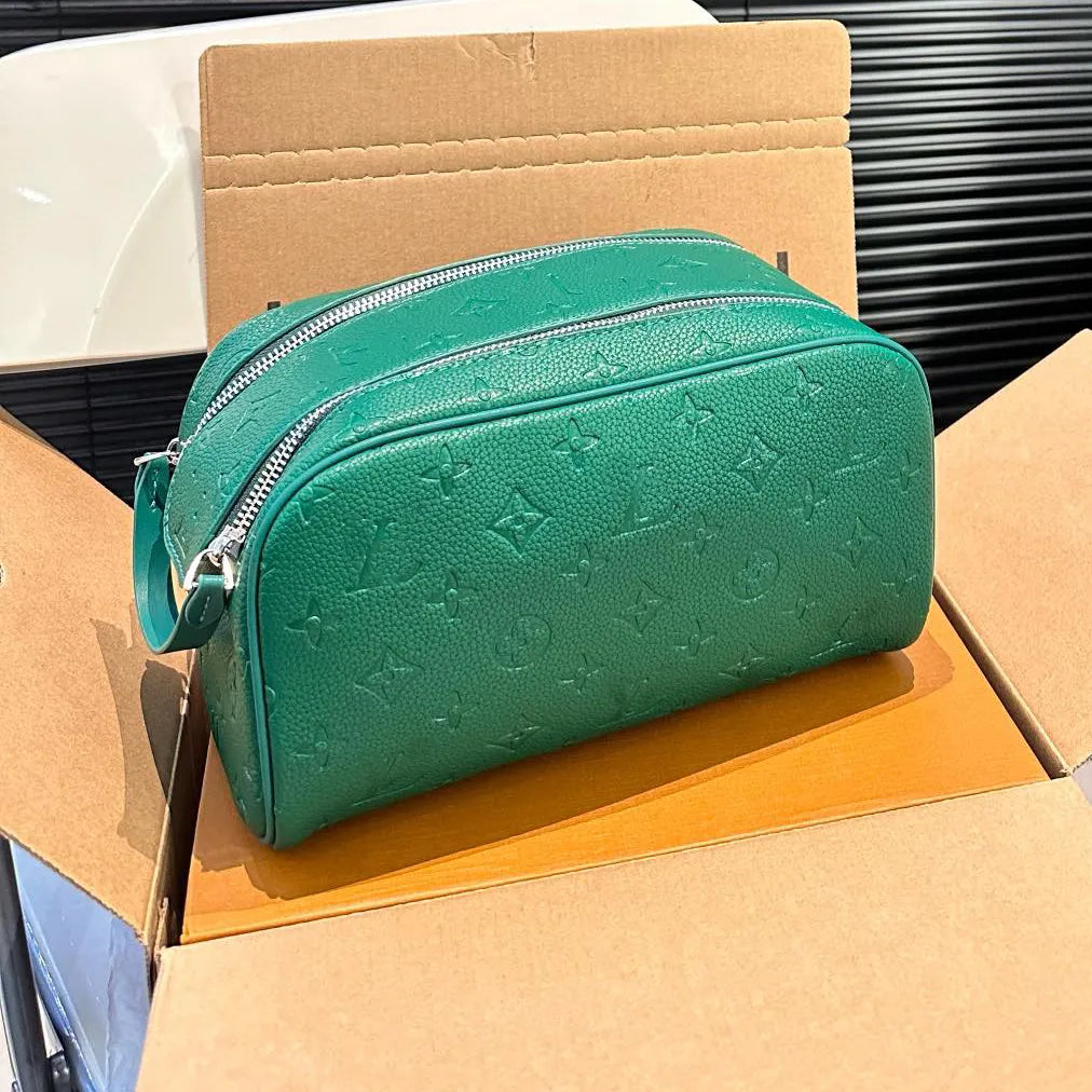 Cosmetic bag placed next to makeup products for size reference