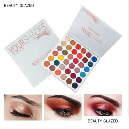 Eyeshadow palette open with color swatches demonstrating pigmentation