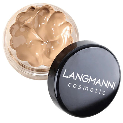 Close-up view of concealer cream texture and consistency