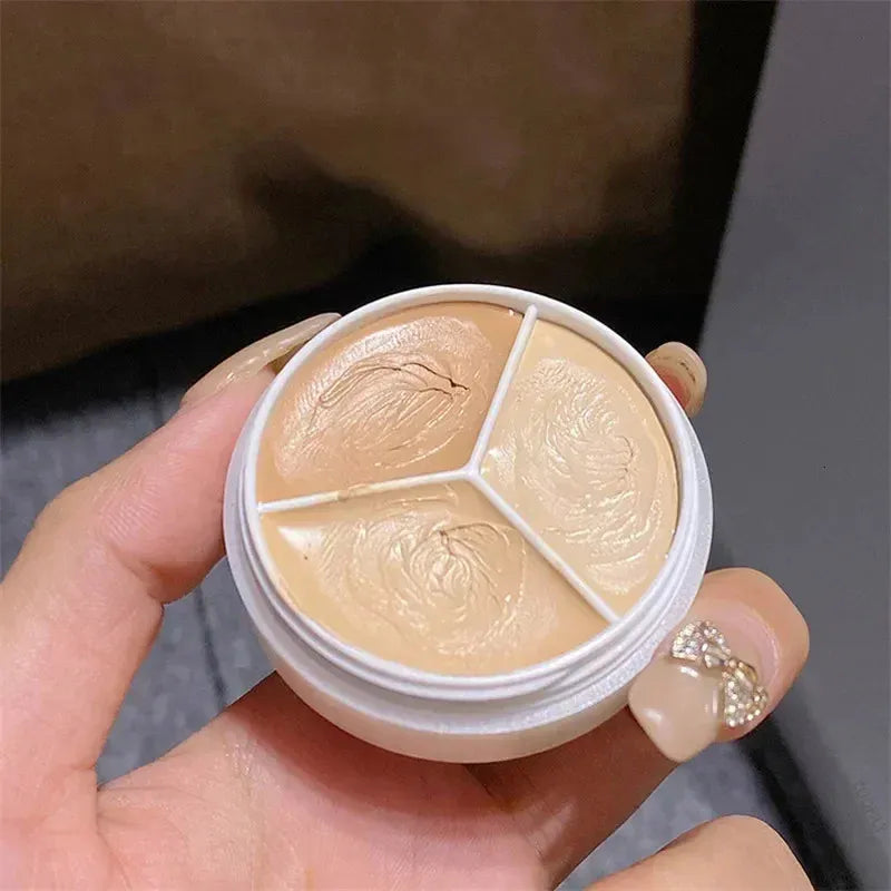 Close-up view of cream concealer texture with smooth, blendable appearance