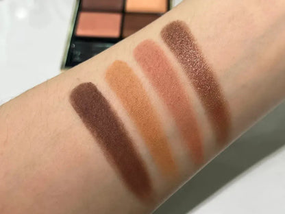 Swatches of eye shadow shades from the quad on skin