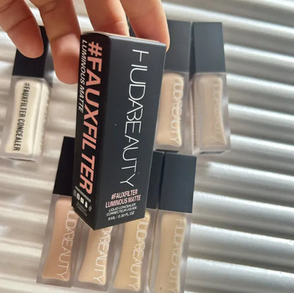 Concealer product displayed with multiple shade options visible
