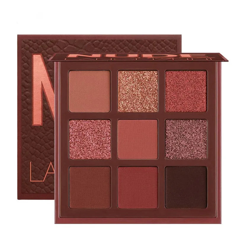 Close-up view of eyeshadow palette with matte and shimmer powder textures