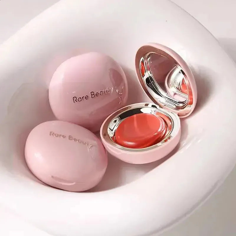 Liquid highlighter and blush duo in packaging