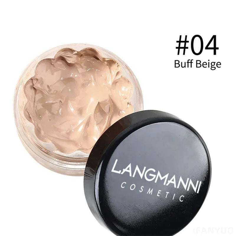 Close-up view of concealer cream being applied to skin