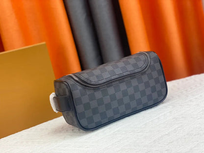 Front view of women's cosmetic bag with zipper closure