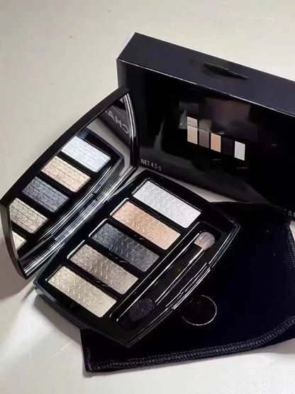 Christmas eyeshadow palette showing five color swatches