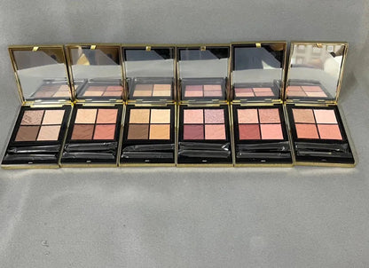Open view of eyeshadow palette displaying four different color shades