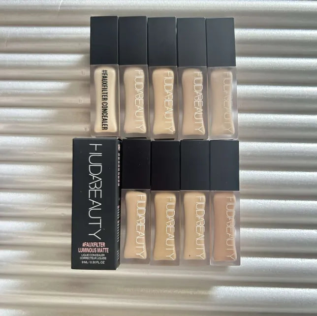Liquid concealer product in 9ml container with applicator