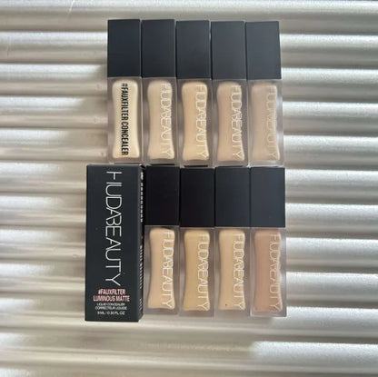 Liquid concealer product in 9ml container with applicator