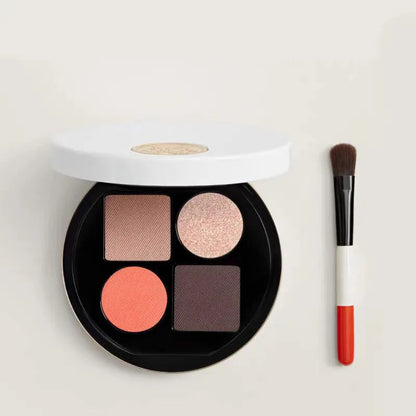 Close-up view of eyeshadow shades showing petal, vegetal, and fauve colors