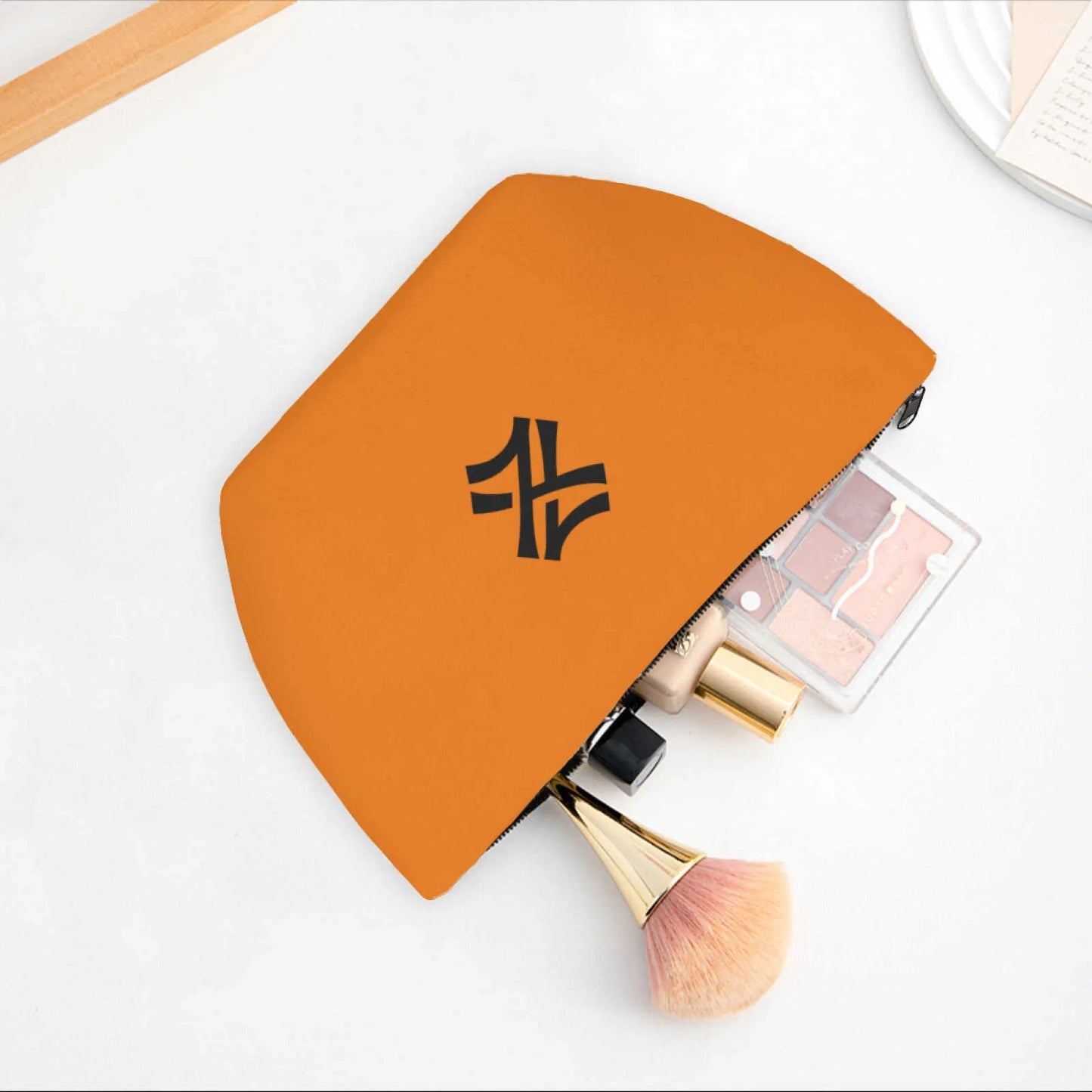 Open cosmetic bag showing interior organizer compartments