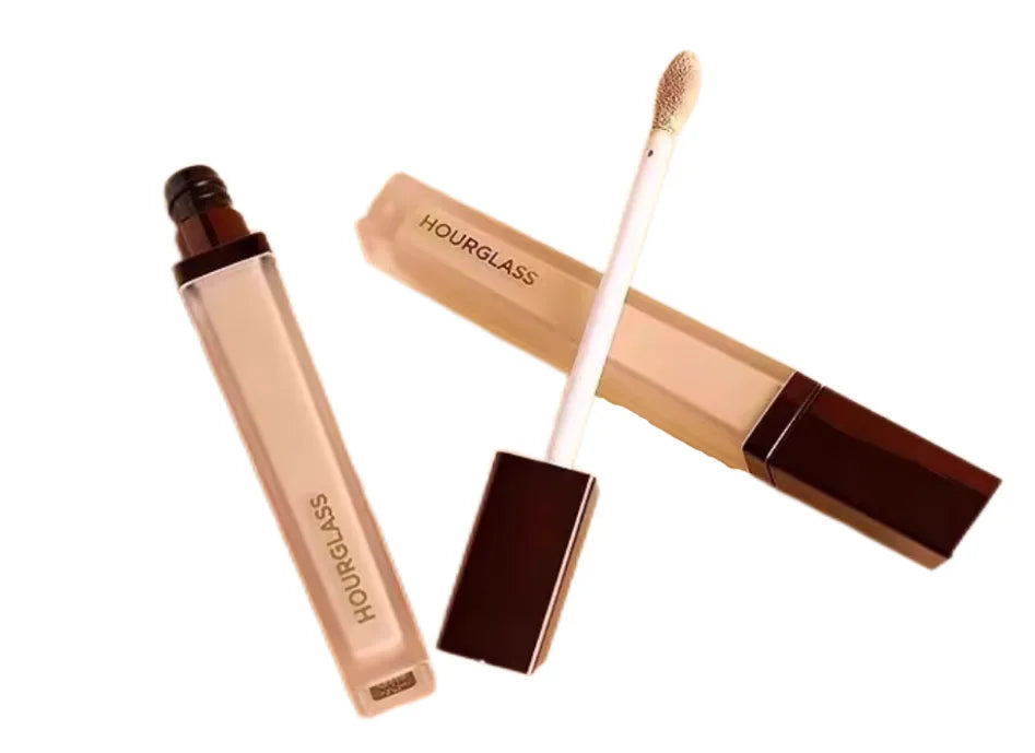 Liquid concealer stick in multiple shade options displayed on a neutral background
