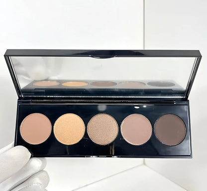 Front view of a 5-color eyeshadow palette showing shimmer and matte shades
