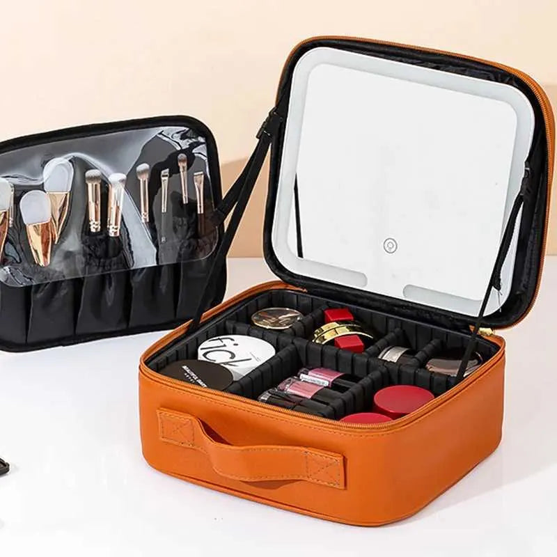 Makeup case interior with brush holder section and multiple storage partitions
